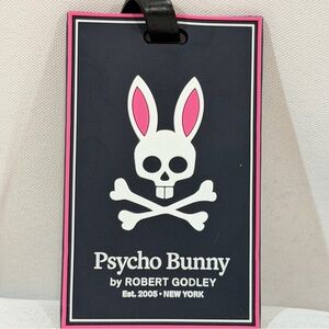 Psycho Bunny luggage Tag Black And Pink Mens Fashion Iconic Accessories